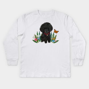Black Fluffy Poodle Sitting on Grass with Flowers Kids Long Sleeve T-Shirt
